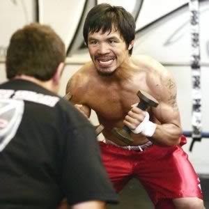 Manny Pacquiao working with his strength and conditioning coach!!!